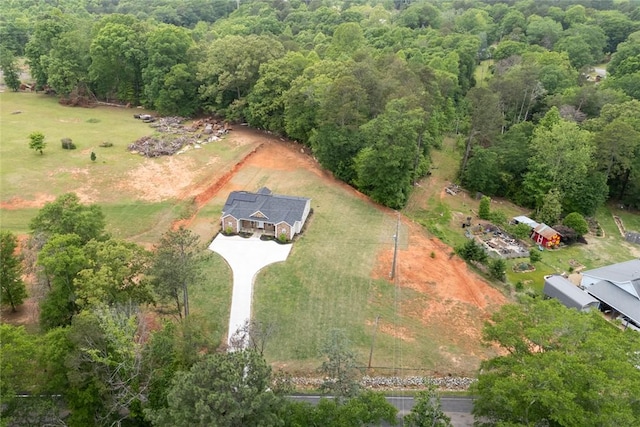 aerial view featuring a forest view
