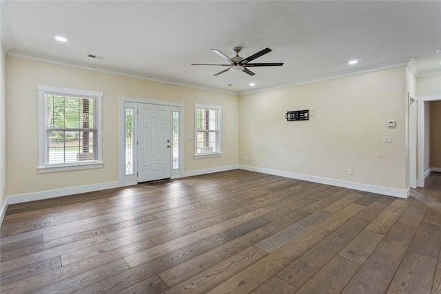 entrance foyer featuring ornamental molding, ceiling fan, and dark wood-style floors