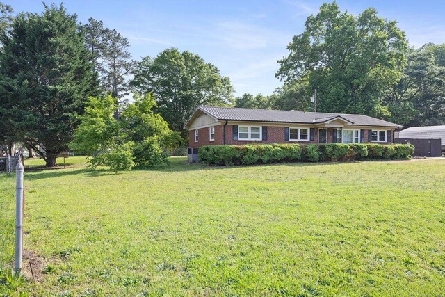 302 Jasmine Dr, Anderson, SC 29625 - ranch-style house with brick siding, a front lawn, and metal roof