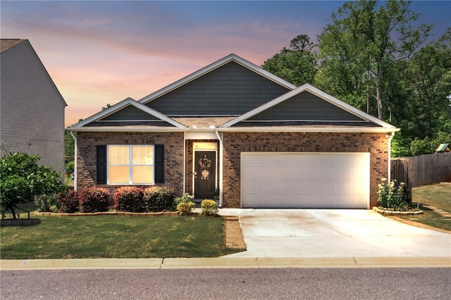 201 Sweetgrass Ln, Piedmont, SC 29673 - craftsman-style home featuring brick siding, fence, a yard, and driveway