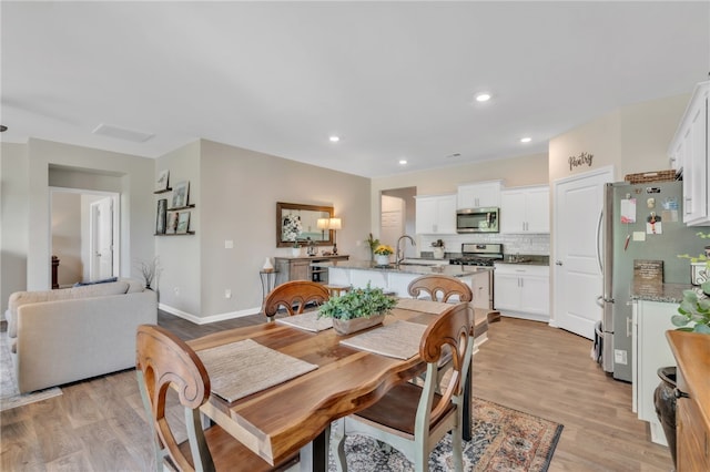 201 Sweetgrass Ln, Piedmont, SC 29673 - dining space with baseboards, recessed lighting, light wood-style flooring, and visible vents