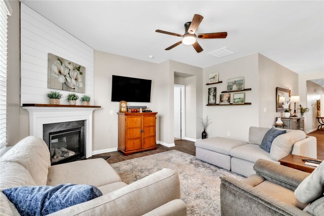 201 Sweetgrass Ln, Piedmont, SC 29673 - living area featuring a fireplace, ceiling fan, baseboards, and dark wood-type flooring