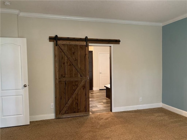 204 Rock Creek Rd, Anderson, SC 29625 - carpeted spare room with crown molding, baseboards, a smoke detector, and a barn door