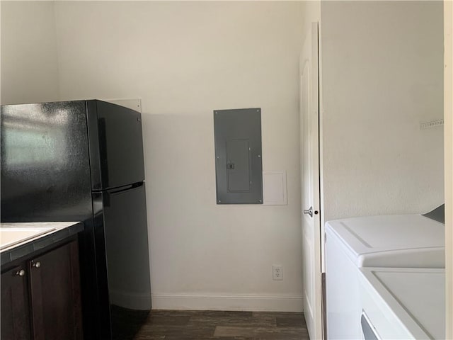 204 Rock Creek Rd, Anderson, SC 29625 - laundry room with electric panel, dark wood-type flooring, baseboards, and washer and dryer
