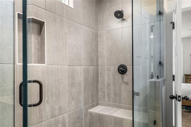 full bathroom featuring a shower stall