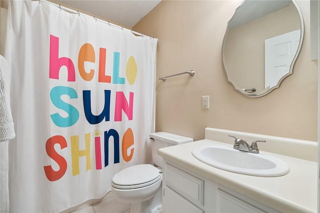 bathroom with toilet, a shower with curtain, tile patterned flooring, and vanity