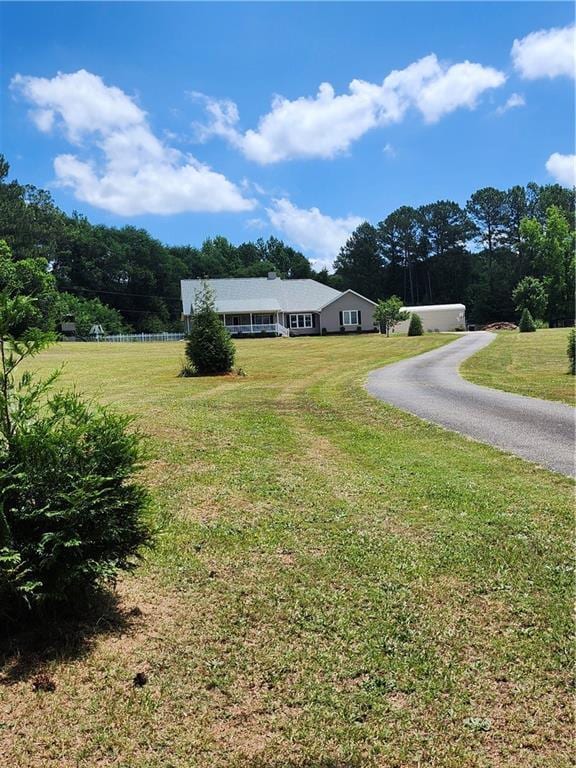 exterior space with a front yard