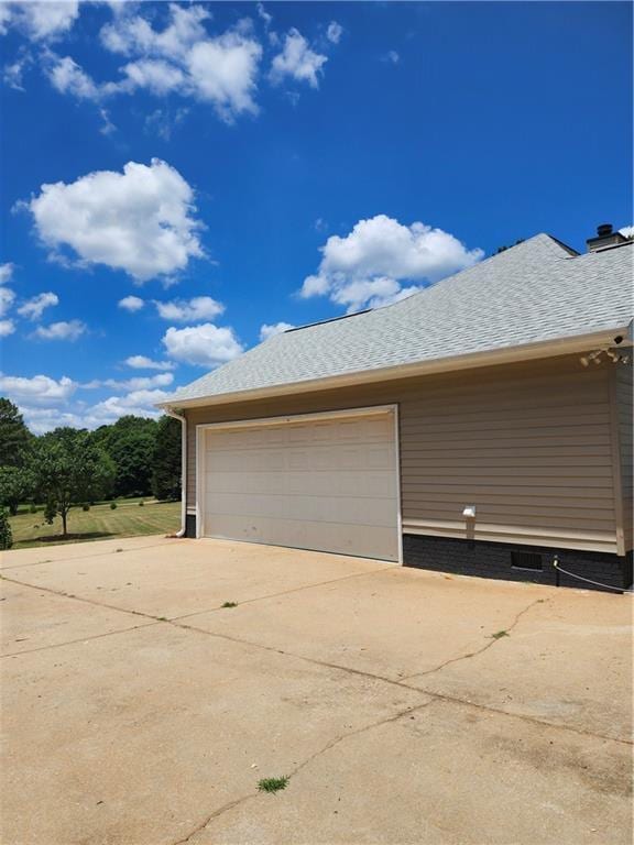 garage with driveway