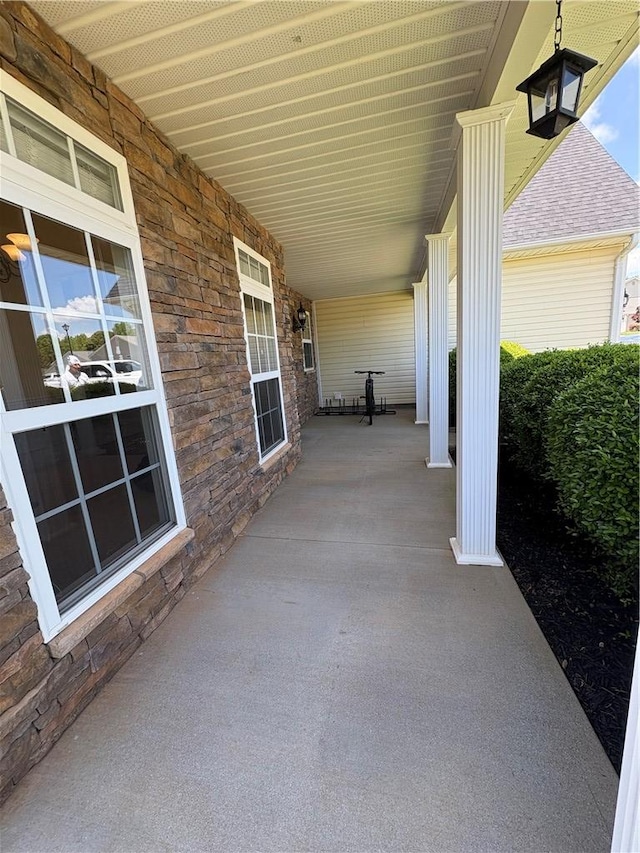 view of patio featuring a porch