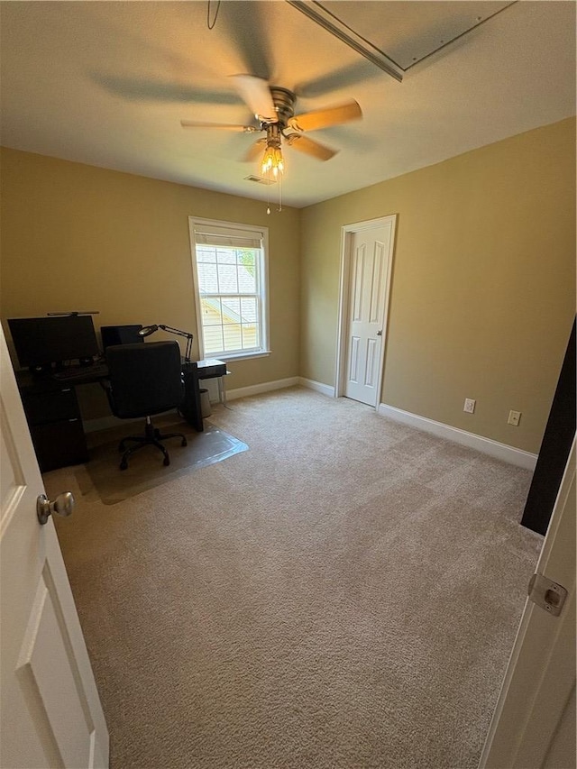 home office with baseboards, a ceiling fan, and carpet floors
