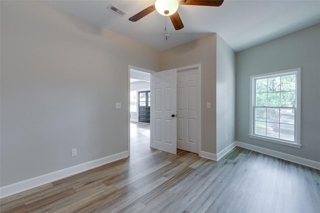9 Dixie Ave, Liberty, SC 29657 - unfurnished bedroom with baseboards, ceiling fan, wood finished floors, and visible vents