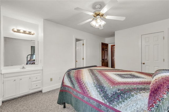 2018 Concord Rd, Anderson, SC 29621 - bedroom featuring ceiling fan, a sink, baseboards, light carpet, and ensuite bath