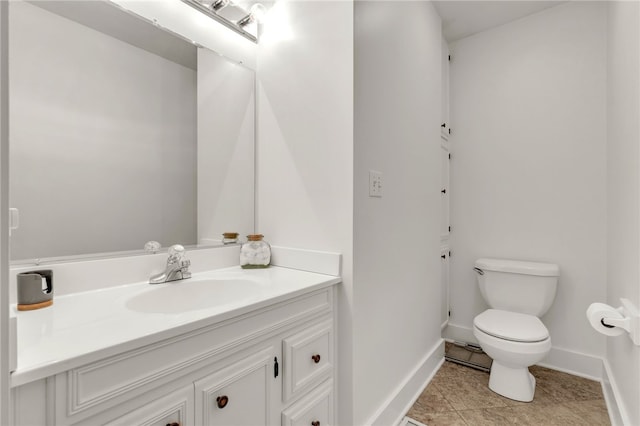 2018 Concord Rd, Anderson, SC 29621 - bathroom with baseboards, tile patterned floors, toilet, and vanity