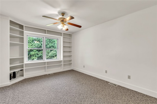 2018 Concord Rd, Anderson, SC 29621 - carpeted empty room featuring baseboards, a ceiling fan, built in shelves, and visible vents