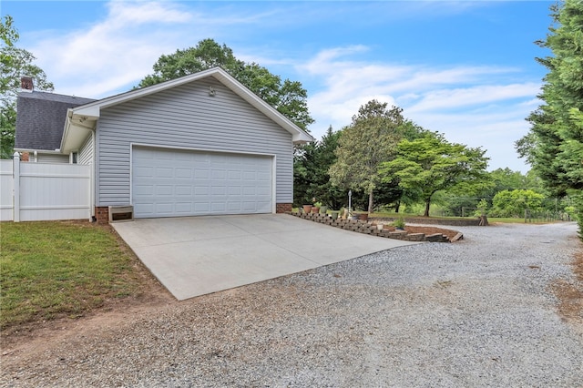 2018 Concord Rd, Anderson, SC 29621 - view of side of home featuring fence, roof with shingles, a garage, a chimney, and driveway