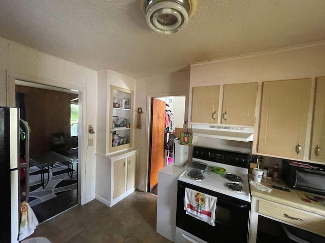 kitchen with range with electric stovetop, a textured ceiling, light countertops, freestanding refrigerator, and under cabinet range hood