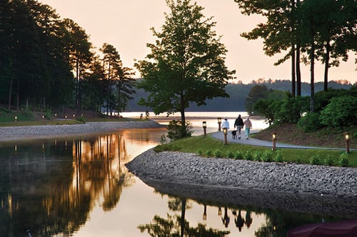 view of home's community with a water view