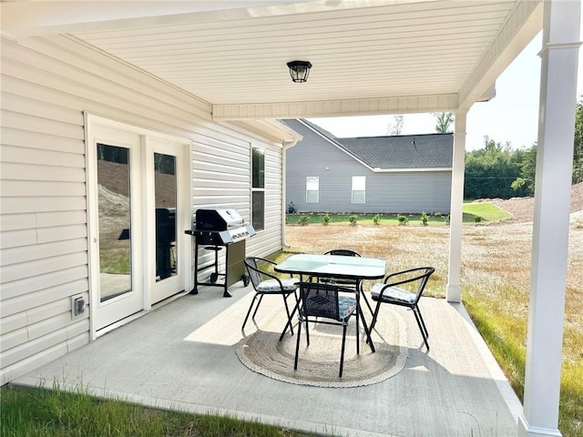 view of patio / terrace with outdoor dining space and area for grilling