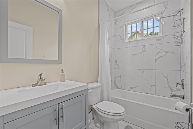 full bathroom featuring vanity, shower / bath combo with shower curtain, and toilet