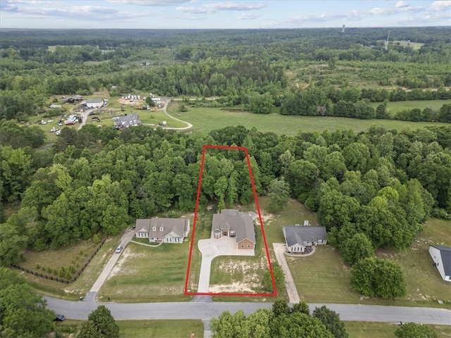 aerial view featuring a forest view