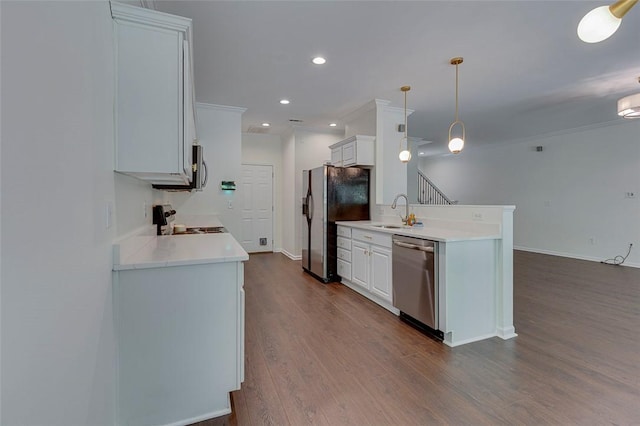 127 Ledgewood Way, Easley, SC 29642 - kitchen with baseboards, light countertops, a sink, dark wood finished floors, and stainless steel appliances