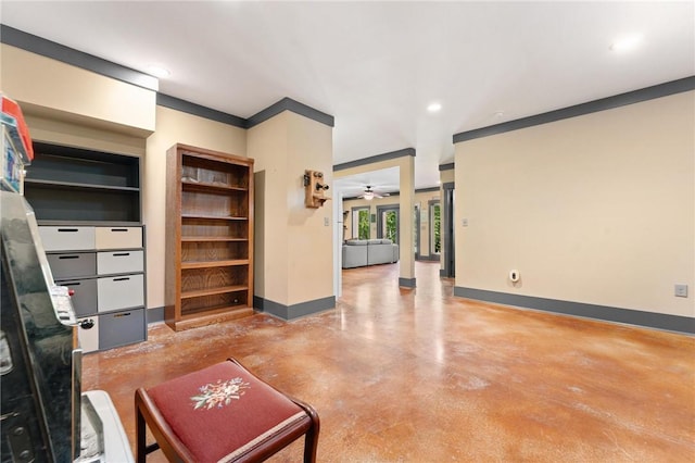 living room with baseboards, recessed lighting, a ceiling fan, and concrete flooring