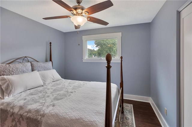 15C Hartwell Villas, Anderson, SC 29626 - bedroom featuring baseboards, a ceiling fan, and dark wood-type flooring