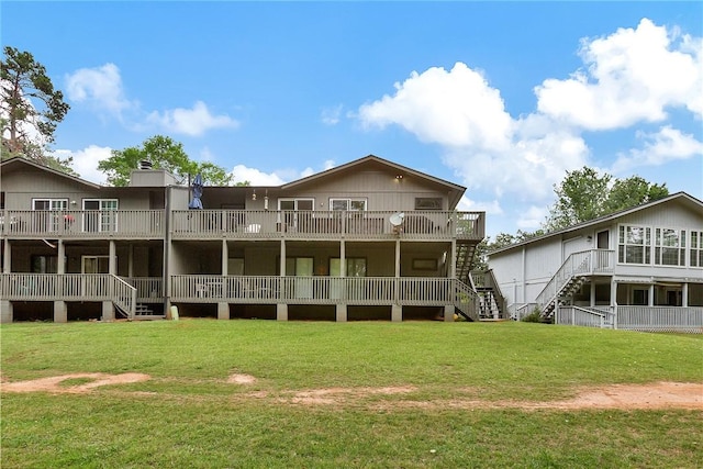 15C Hartwell Villas, Anderson, SC 29626 - rear view of house with stairway, a yard, and a wooden deck