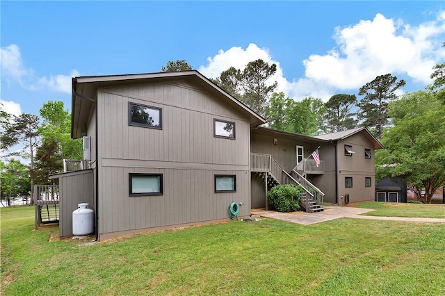 15C Hartwell Villas, Anderson, SC 29626 - rear view of property with a lawn, stairs, and a patio area