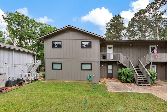 15C Hartwell Villas, Anderson, SC 29626 - view of front of property with stairs, a deck, and a front lawn