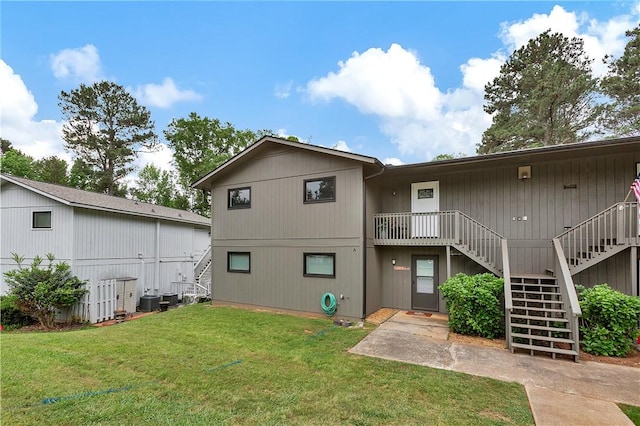 15C Hartwell Villas, Anderson, SC 29626 - back of property featuring stairs, central air condition unit, and a yard