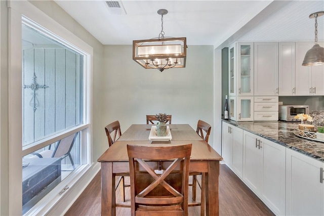 15C Hartwell Villas, Anderson, SC 29626 - dining space featuring a chandelier, visible vents, dark wood finished floors, and a toaster
