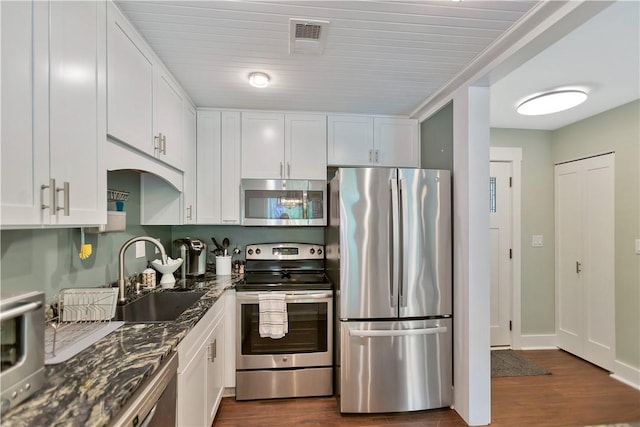 15C Hartwell Villas, Anderson, SC 29626 - kitchen featuring white cabinets, stainless steel appliances, dark wood-style floors, and a sink