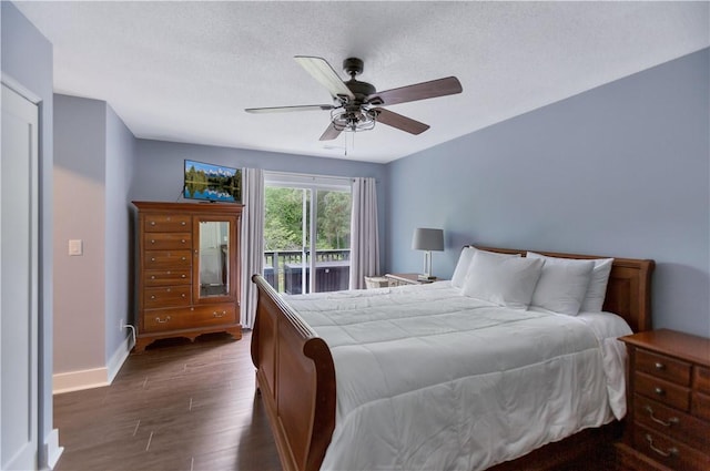 15C Hartwell Villas, Anderson, SC 29626 - bedroom featuring baseboards, a ceiling fan, dark wood-style flooring, and a textured ceiling