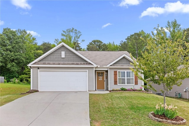 single story home with a front yard, a garage, and driveway
