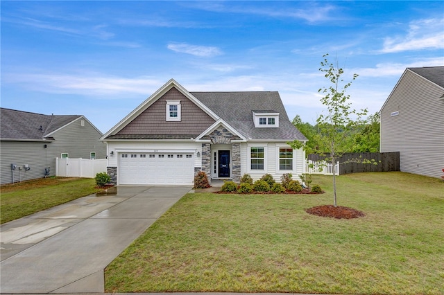 view of front of house with stone siding, concrete driveway, and an attached garage