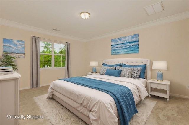 bedroom featuring ornamental molding, light carpet, and baseboards