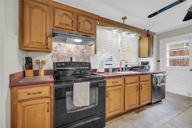 217 Hughes St, Seneca, SC 29672 - kitchen featuring a sink, black range with electric cooktop, stainless steel dishwasher, under cabinet range hood, and decorative backsplash