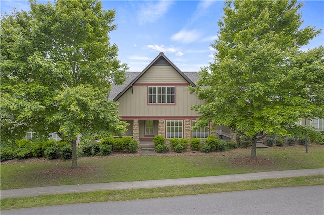 101 W Ln Unit 1004, Clemson, SC 29631 - view of front of home with a porch, a front lawn, brick siding, and roof with shingles