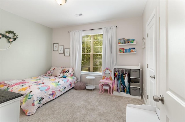 carpeted bedroom with visible vents
