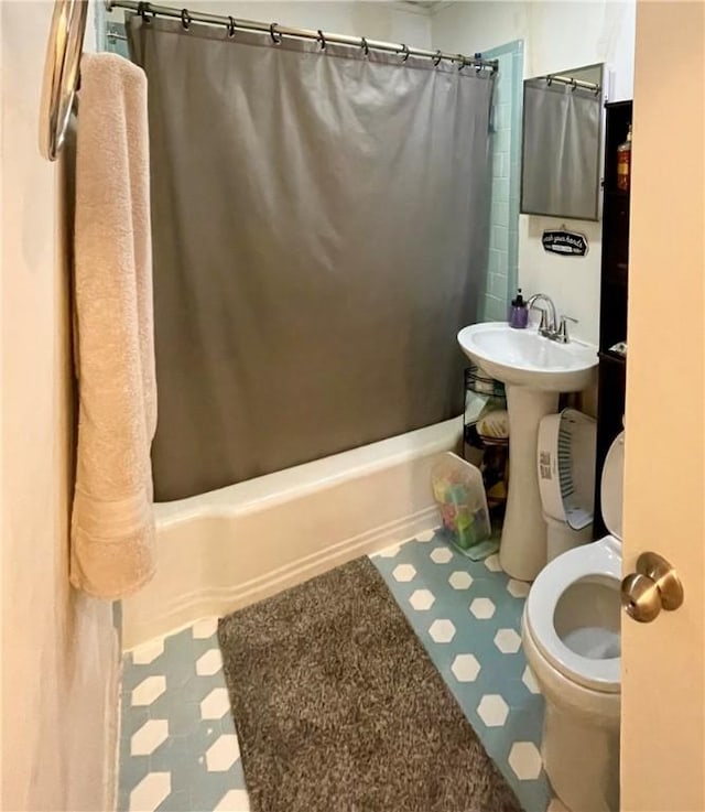 203 Adams St, Westminster, SC 29693 - bathroom with tile patterned floors, toilet, shower / tub combo, and a sink