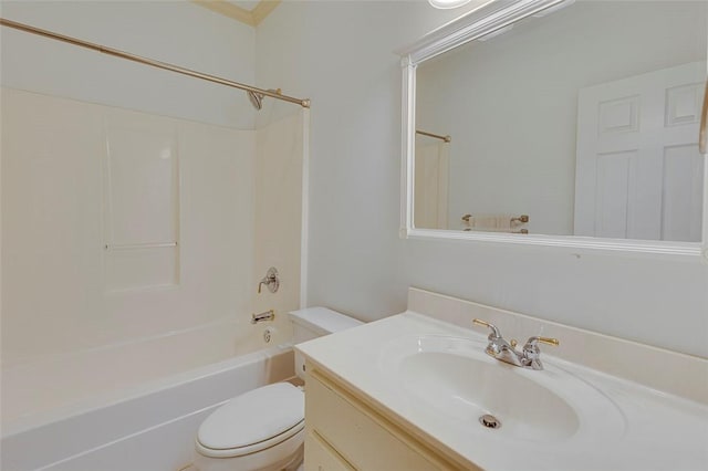 bathroom with vanity, toilet, and bathtub / shower combination