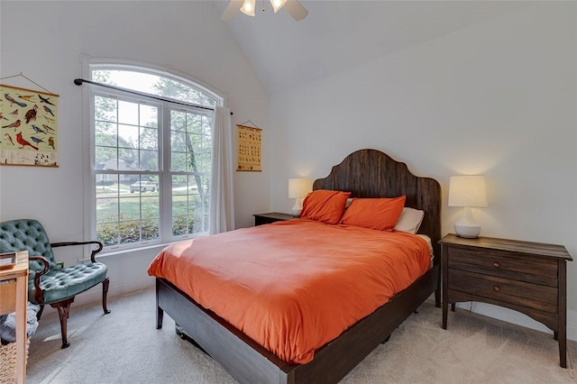 bedroom featuring high vaulted ceiling, light colored carpet, baseboards, and a ceiling fan