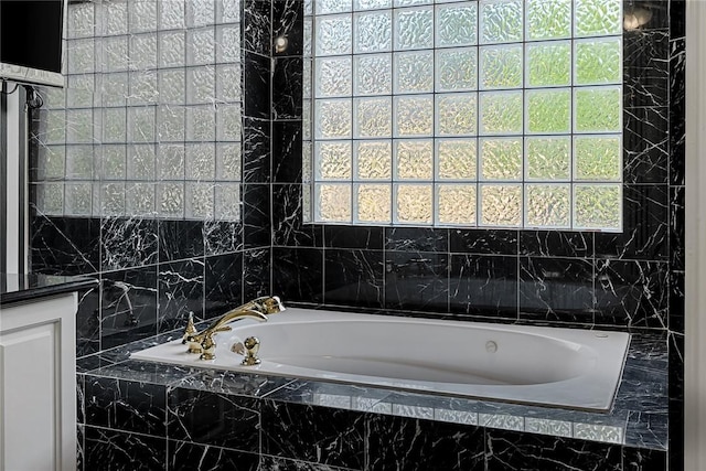 107 Amanda Dr, Anderson, SC 29621 - bathroom featuring a bath and a healthy amount of sunlight