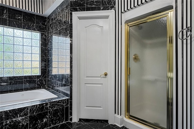 107 Amanda Dr, Anderson, SC 29621 - bathroom featuring a bath, plenty of natural light, marble finish floor, and a shower stall