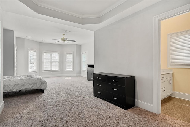 107 Amanda Dr, Anderson, SC 29621 - carpeted bedroom with ensuite bathroom, crown molding, ceiling fan, a tray ceiling, and baseboards