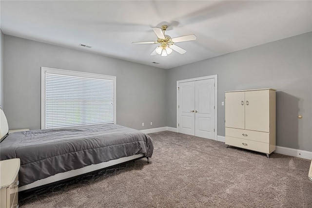 107 Amanda Dr, Anderson, SC 29621 - bedroom featuring a ceiling fan, a closet, baseboards, visible vents, and carpet floors
