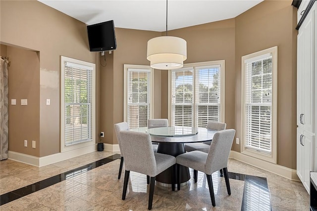 107 Amanda Dr, Anderson, SC 29621 - dining room with baseboards, marble finish floor, and a healthy amount of sunlight