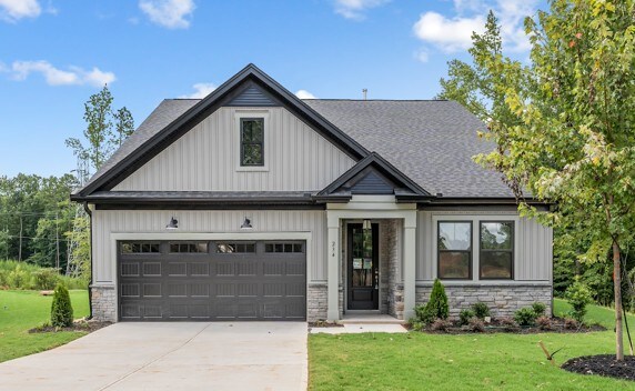 155 Palmer Ln, Westminster, SC 29693 - view of front of house with stone siding, board and batten siding, driveway, and a front yard
