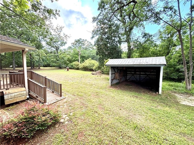 5192 Davis Cir, Anderson, SC 29625 - view of green lawn with a pole building, an outdoor structure, and a detached carport